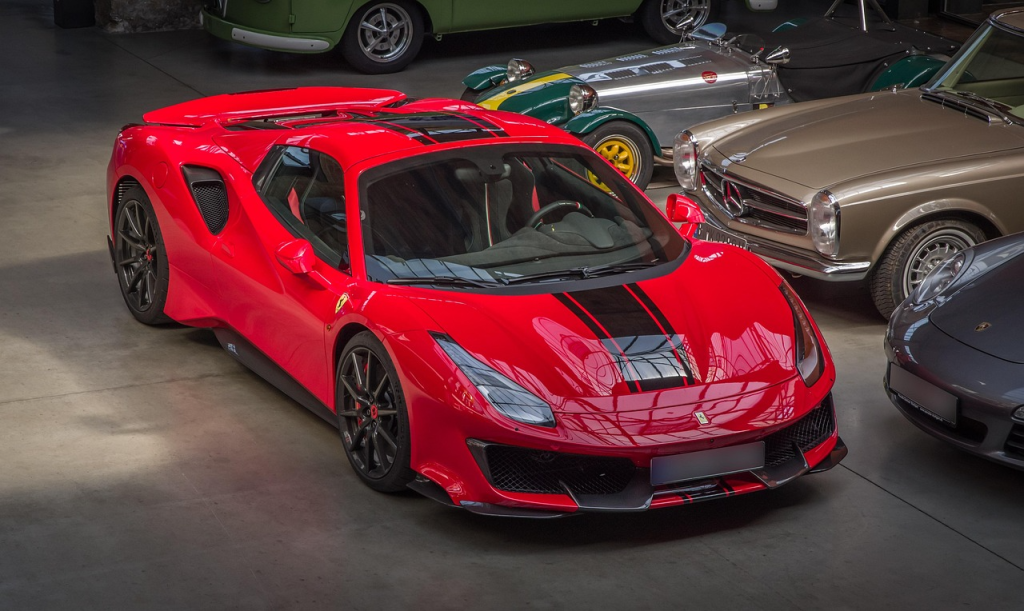 red ferrari used as a featured image of the blog post on Luxury Cars Are Learning to Drive Themselves